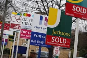 Property for sale signs. Getty Images