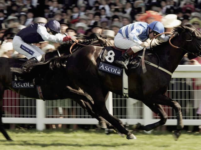 John Egan and Les Arcs lead the Jamie Spencer ridden Balthazaar's Gift home to land The Golden Jubilee Stakes run at Ascot on June 24, 2006 (photo by Julian Herbert/Getty Images)