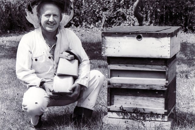 Philip Cunningham of Brompton Road, Sprotbrough, with some of the beeswax he and other Doncaster beekeepers have donated to York Minster, July 1984