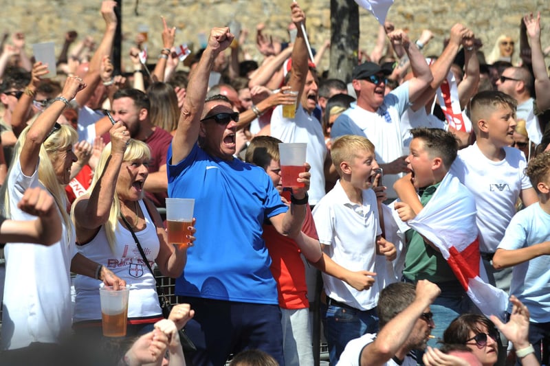 England fans celebrate as the team scores against Sweden in their World Cup Quarter Final match, at the Fanzone Low Row in 2018. Were you there?