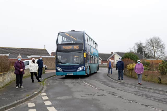 L-r Concerned residents Lesley Illman, Julie Marley, Colyn Firth, Francis Jackson, Town Councillor and Mayor of Askern, John McLaughlin, Town Councillor and Iris Beech, Askern and Norton ward Councillor, pictured on Coniston Road by one of the bends the Buses have to navigate.  Picture: NDFP-02-03-21 Coniston Buses 1-NMSY