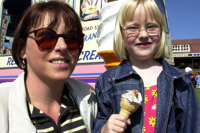 Sandra Gregory and daughter Faye, six, from Ecclesall chilled out with an ice cream in the warming sun at Sheffield Show in 2000