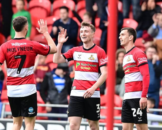 James Maxwell celebrates his goal in Doncaster's 4-0 win over Accrington Stanley.