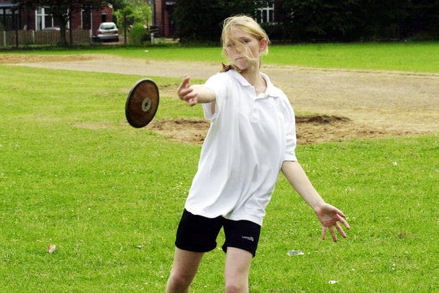 Emily Toyne, 12, breaks the year seven discus school record (which was set in 2001) throwing at a distance of 16.28m at the sports day at Hungerhill School, Edenthorpe, June 15, 2006