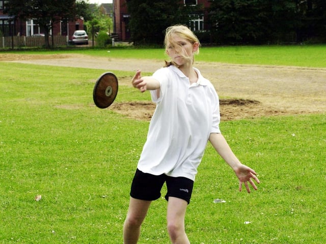 Emily Toyne, 12, breaks the year seven discus school record (which was set in 2001) throwing at a distance of 16.28m at the sports day at Hungerhill School, Edenthorpe, June 15, 2006