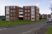 Police found the body of a 64-year-old man at the flats in Maple Grove, Conisbrough.