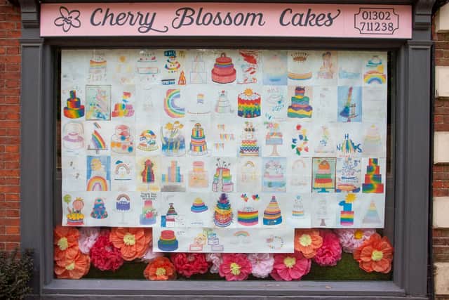 Cake drawings in the window.