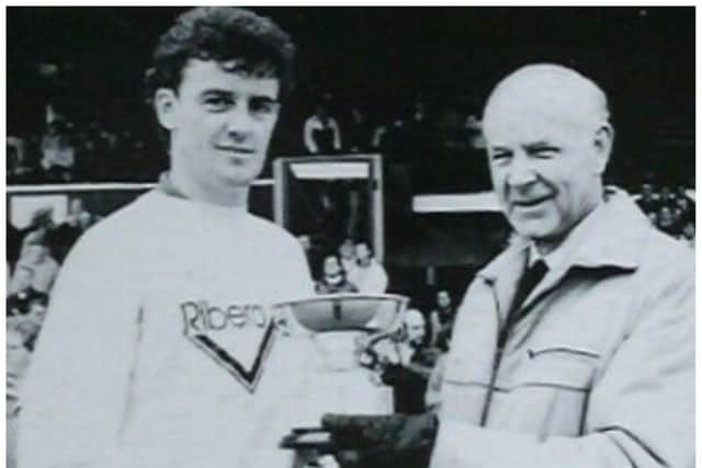 Dr Erskine (right) presents an award to Doncaster Rovers' favourite Colin Douglas at Belle Vue during the early 1990s.