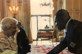 Kingsley Avagah meeting the queen.