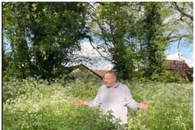The area has become overgrown with weeds - and councillors are demanding action.
