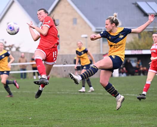 Jasmine Saxton netted for the Belles at Huddersfield but they couldn't prevent a derby defeat.
