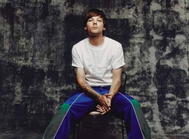 Doncaster's Louis Tomlinson says the first One Direction album was "s***"