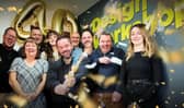 Managing Director, Ian Croney, and Director James McWilliam celebrate with the DW team