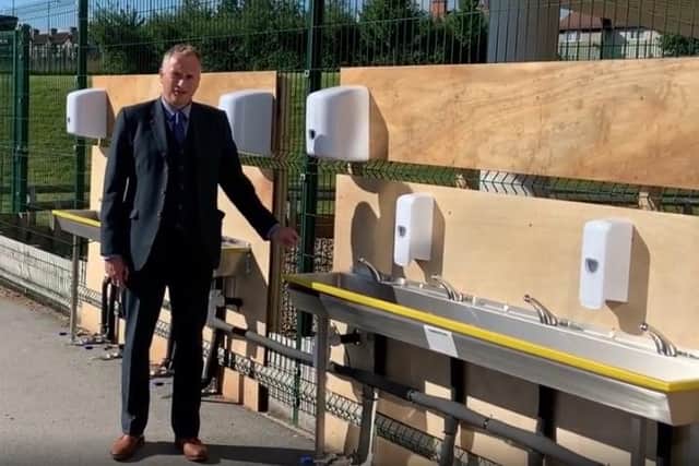 Nick Veal, assistant Principal, with handwashing basins installed outside Outwood Academy Adwick