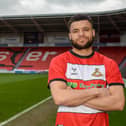 Maxime Biamou has signed a "short-term" contract at Rovers.