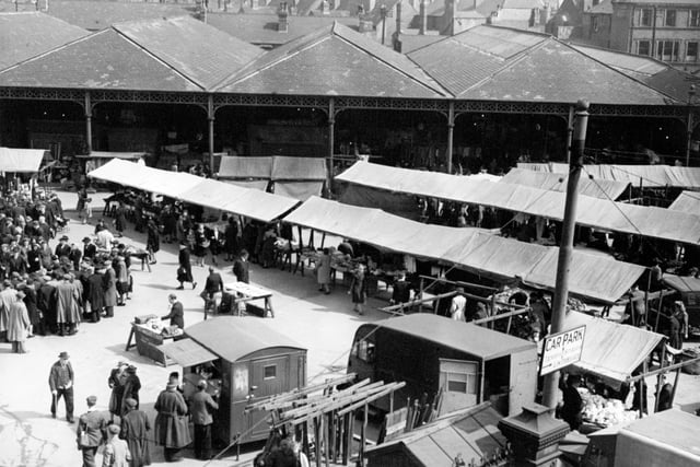 Doncaster open greengrocery market with the covered-in market in the background, April 1947