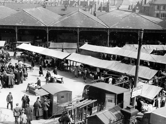 Doncaster open greengrocery market with the covered-in market in the background, April 1947