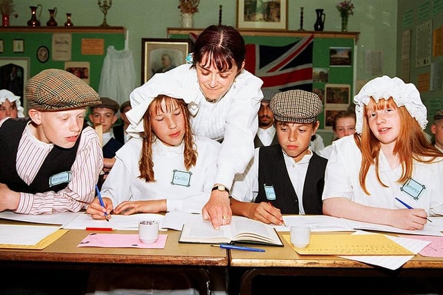 McAuley teacher Karen Hind is pictured with pupils, from left, Matthew Lodge, Cora Moodie, John Coleman and Sarah Copperwheat, all aged 12, June 1997