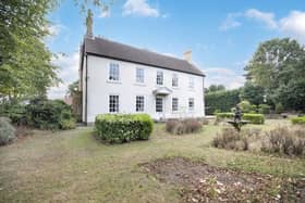 The Old Vicarage in Finningley, with surrounding gardens.