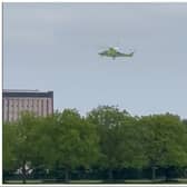 The air ambulance has been filmed landing near Town Fields this afternoon. (Photo/video: Karl Faulkner).