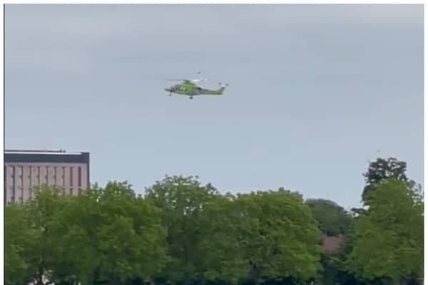 The air ambulance has been filmed landing near Town Fields this afternoon. (Photo/video: Karl Faulkner).