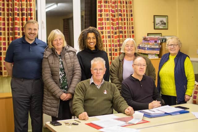 Members of Adwick upon Dearne Parish Council with (standing, centre) Jamilah Hassan of the Banks Group.
