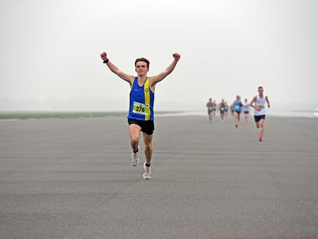 Kian Derbyshire leads the pack on the runway, only to finish overall second to his brother Craig