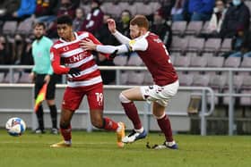 Tyreece John-Jules powers away from Cian Bolger. Picture: Andrew Roe/AHPIX