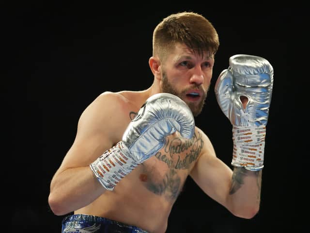 Jason Cunningham will be back in the ring this summer (photo by James Chance/Getty Images).
