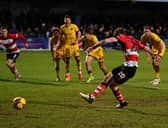 Joe Ironside dispatched Doncaster's late penalty las weekend at Sutton.