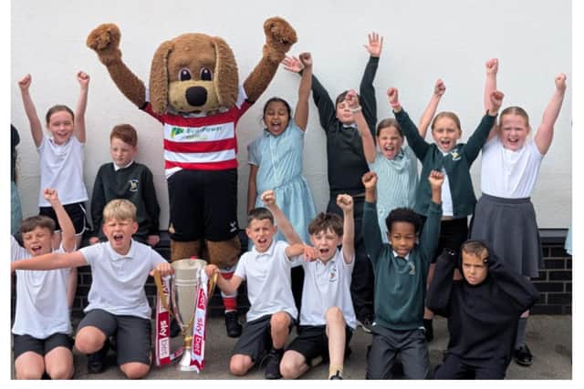 Doncaster Rovers are taking the League Two trophy on tour across the city.