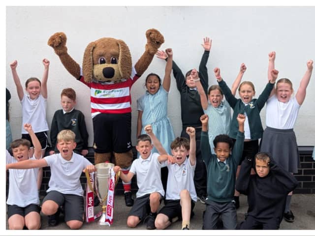 Doncaster Rovers are taking the League Two trophy on tour across the city.