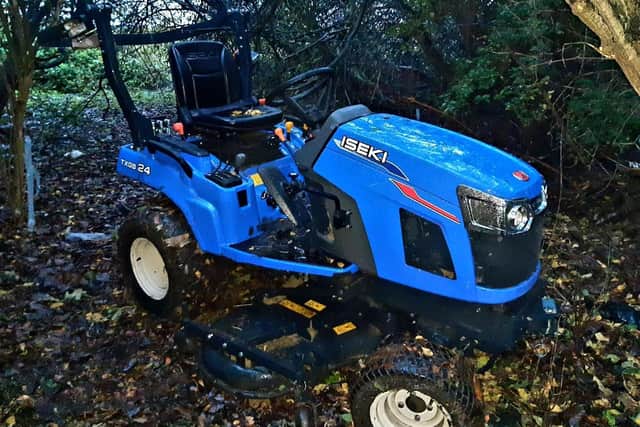 The tractor was found hidden deep in woods in Doncaster.