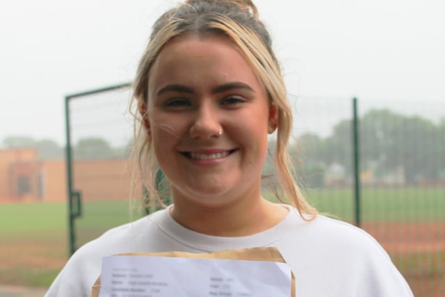 Kate Mowbray from English Martyrs receiving her results.