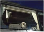 Windows were smashed after Rochdale fans pelted supporters club buses with bricks.