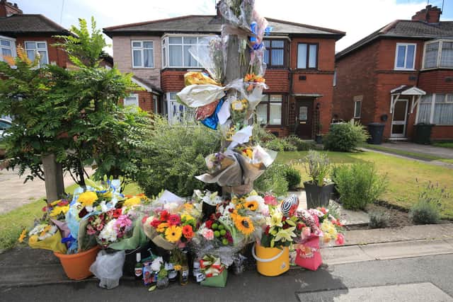 Flowers at the scene of a fatal crash on Wheatley Hall Road, Doncaster.