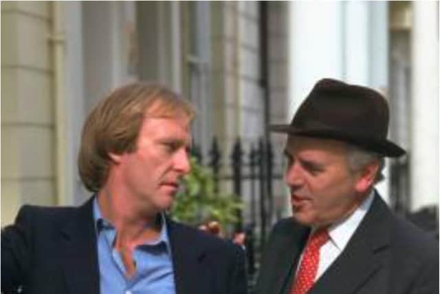 Dennis Waterman (left) with George Cole in hit ITV series Minder. (Photo: Getty)