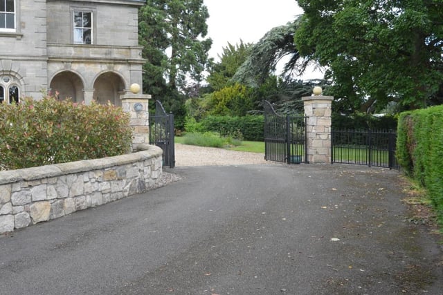 Driveway and gated entrance.