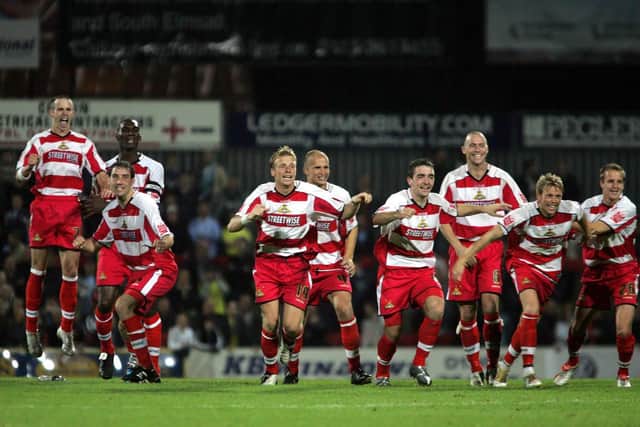 Rovers celebrate after their penalty shootout win over Manchester City in the Carling Cup