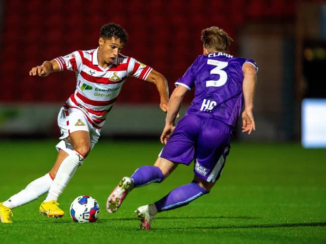 Kyle Knowle goes past Max Clark in search of a breakthrough.