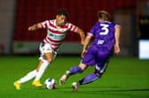 Kyle Knowle goes past Max Clark in search of a breakthrough.