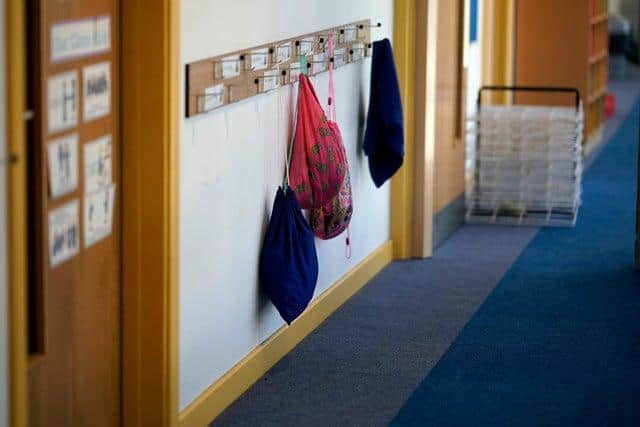 Pupils advised to stay off school if someone in their house tests positive for covid.