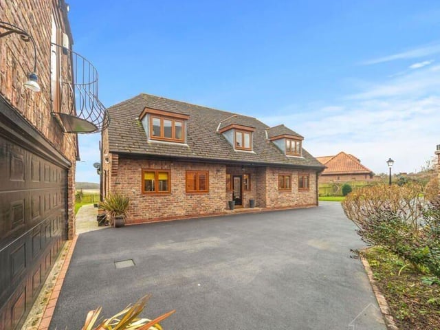 The approach to the property for sale in the village of Burghwallis.