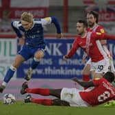 Matt Smith in action against Morecambe. Photo: Howard Roe/AHPIX LTD