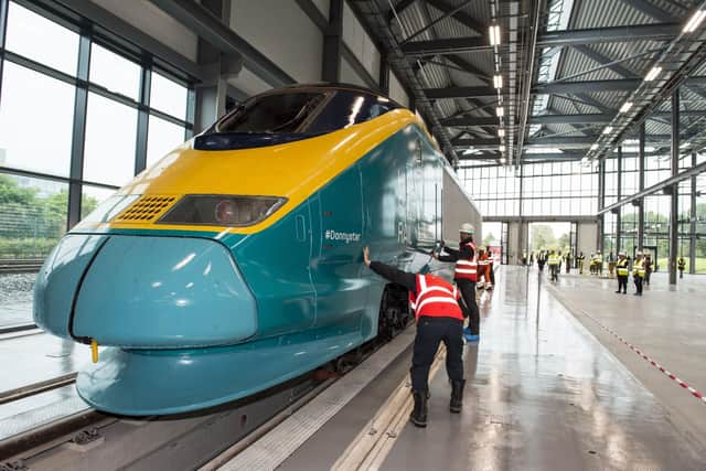 A refurbished Eurostar power car engine arrives at the National College for High Speed Rail at Doncaster