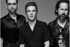 Brandon Flowers (centre) of The Killers says he can't wait to come to Doncaster.