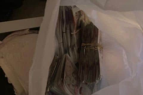 Officers discovered £11, 000 and a quantity of Class A drugs thought to be cocaine at an address in Doncaster yesterday.