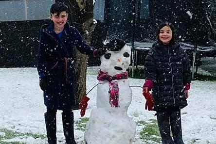 Katie Spencer shared this image of children making a snowman.