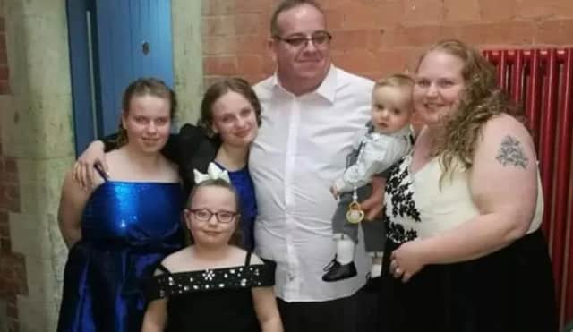Darren and Kirsty Hampson with their children Ellie 16, Fay 14, Sarah 10 and Lewis 4.