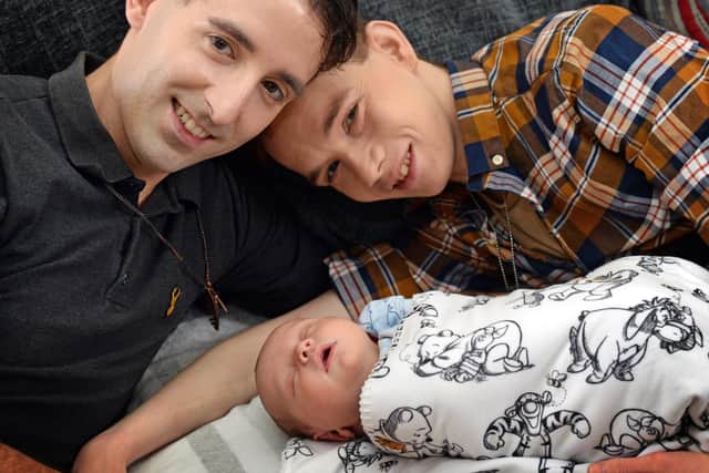 Harvey Cooper and Adam Williams, pictured with their son Jacob. Picture: NDFP-09-02-21-HarveyAdam 5-NMSY